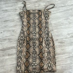 Pattering snakeskin dress
